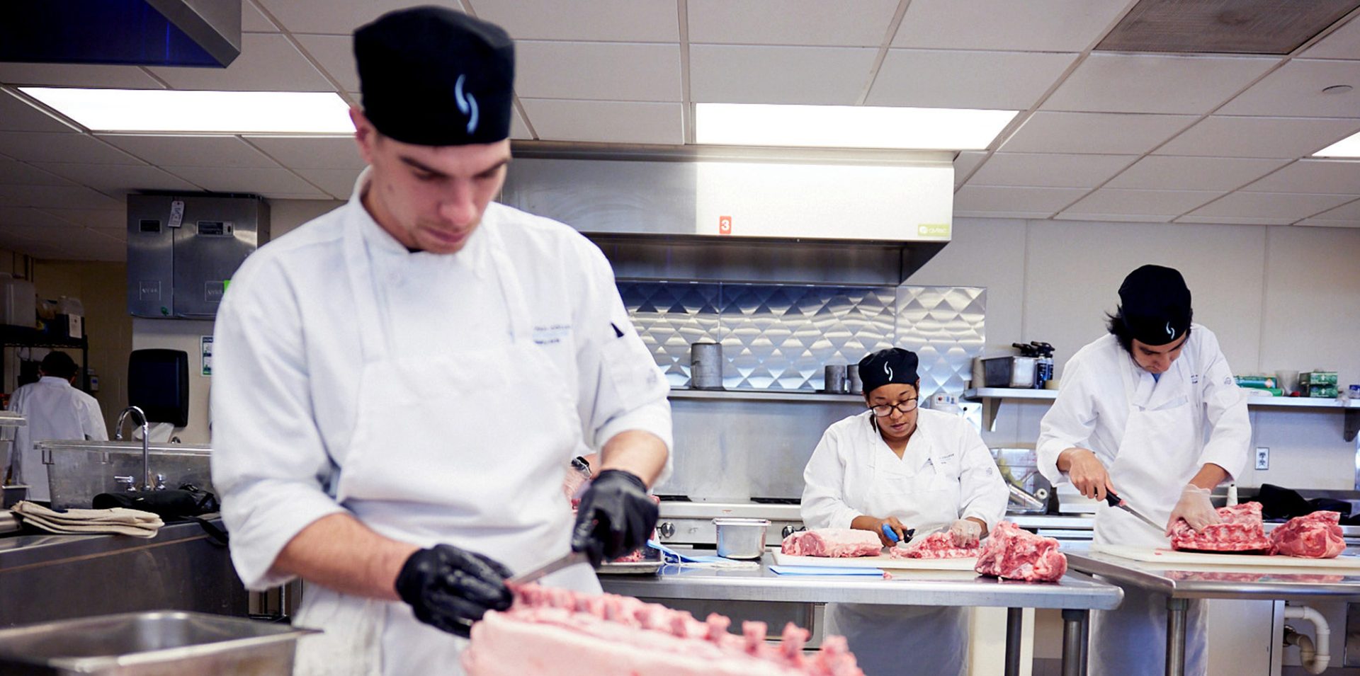 Photo of students in Culinary Arts class.