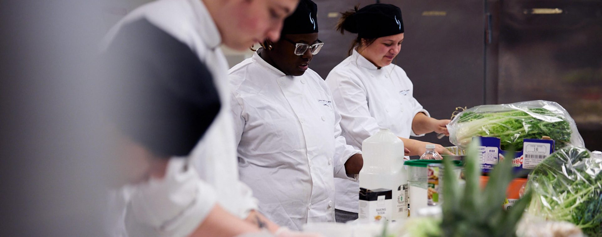 Students preparing food in the Culinary Arts program.