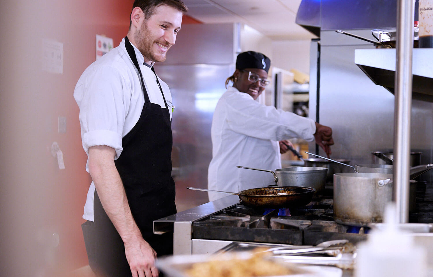 Student cooking in the Culinary Arts program.