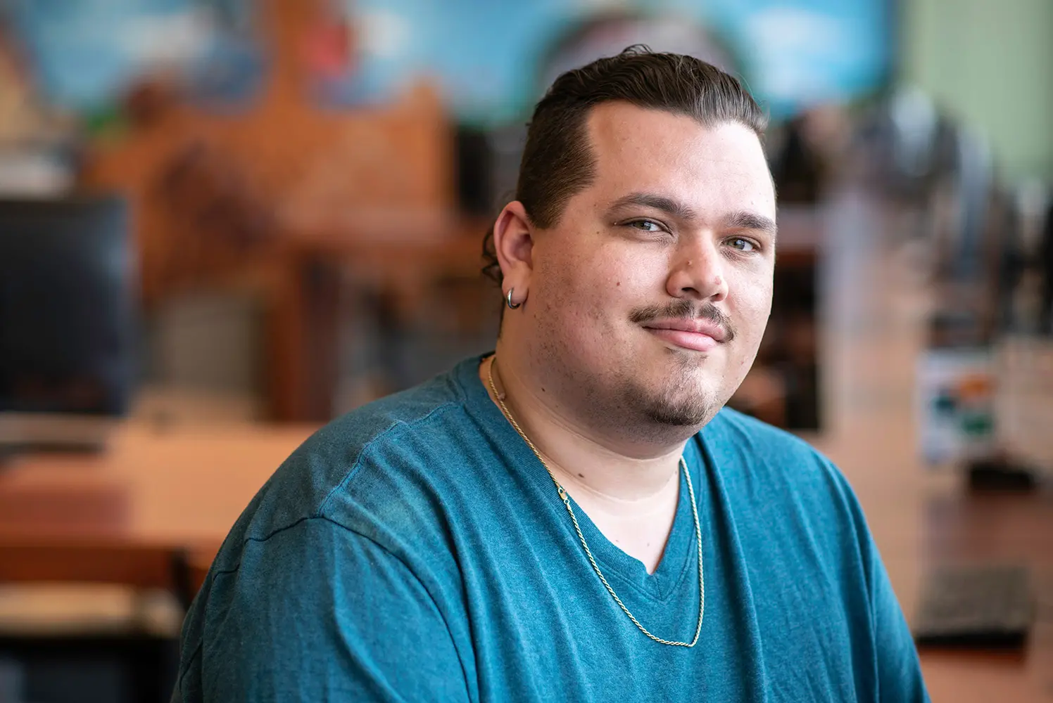 Photo of a Saint Paul College student on campus.