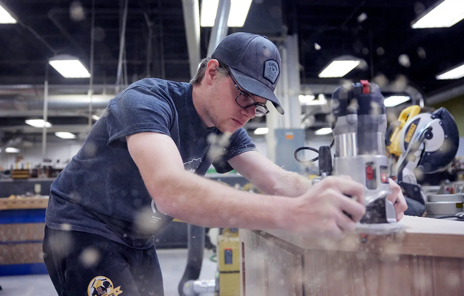 Photo of a student in the shop.