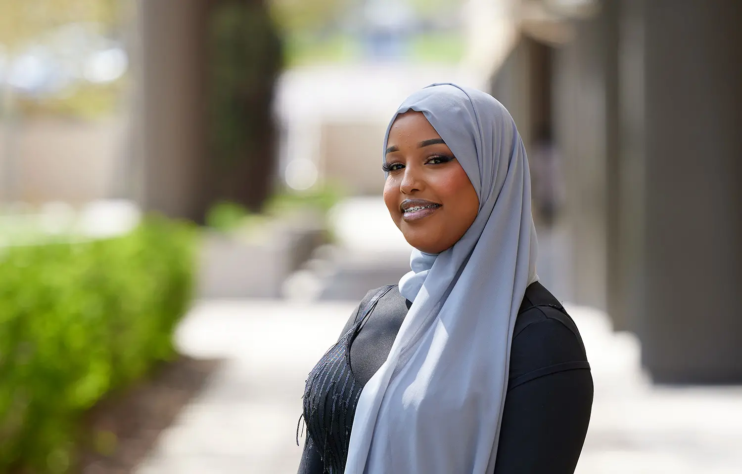 Photo of a Saint Paul College student on campus.