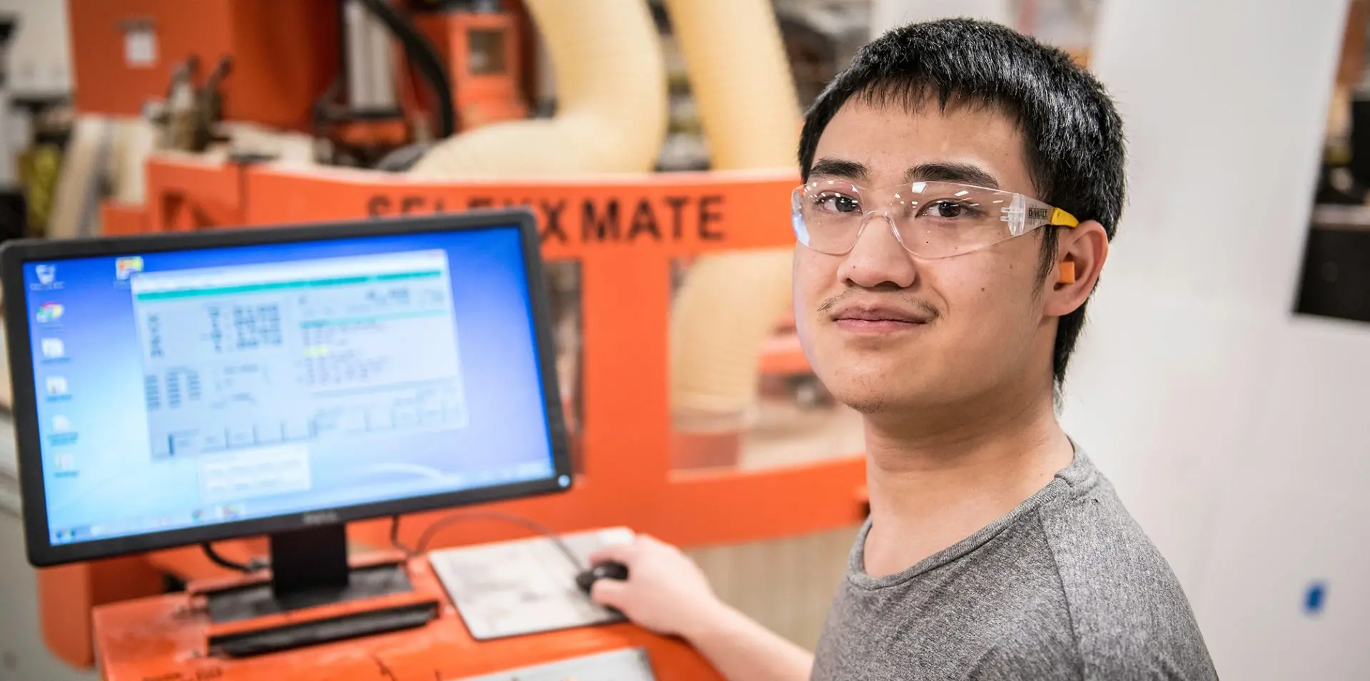 Photo of a student in the shop.