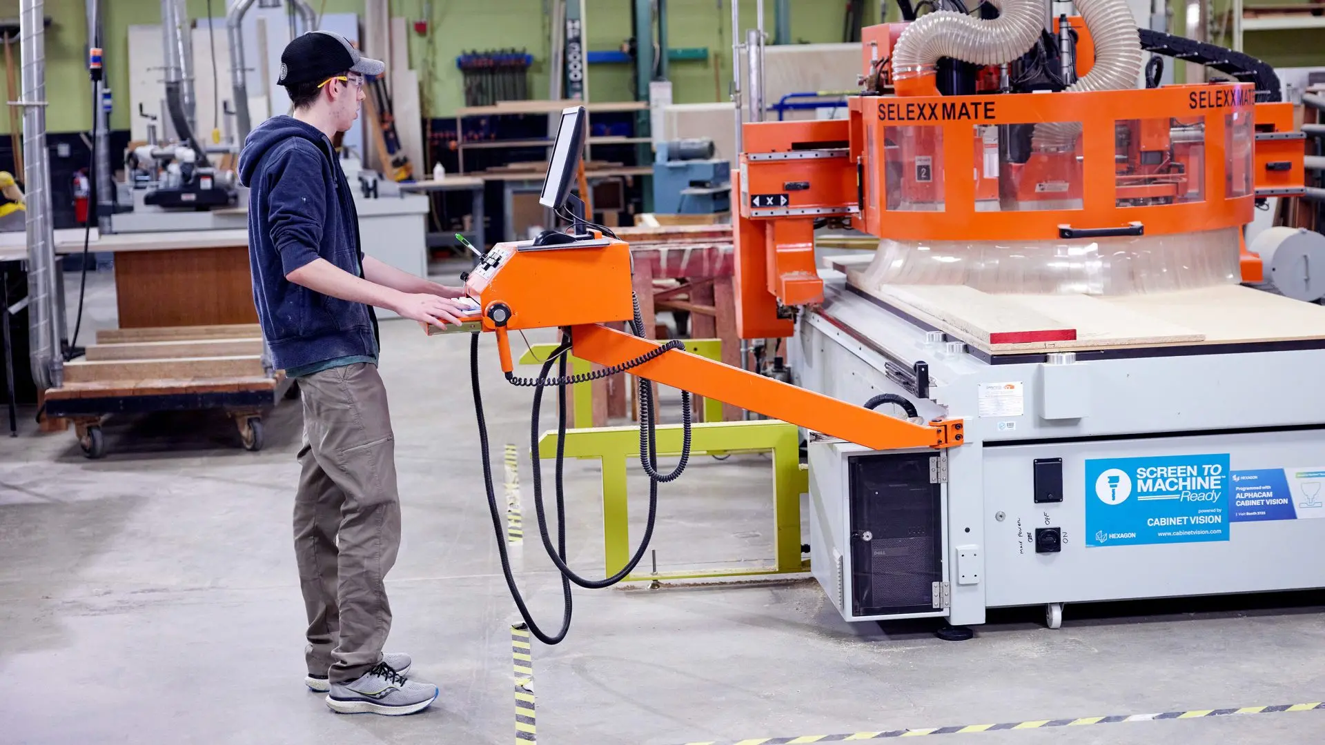 Photo of a student in the shop.