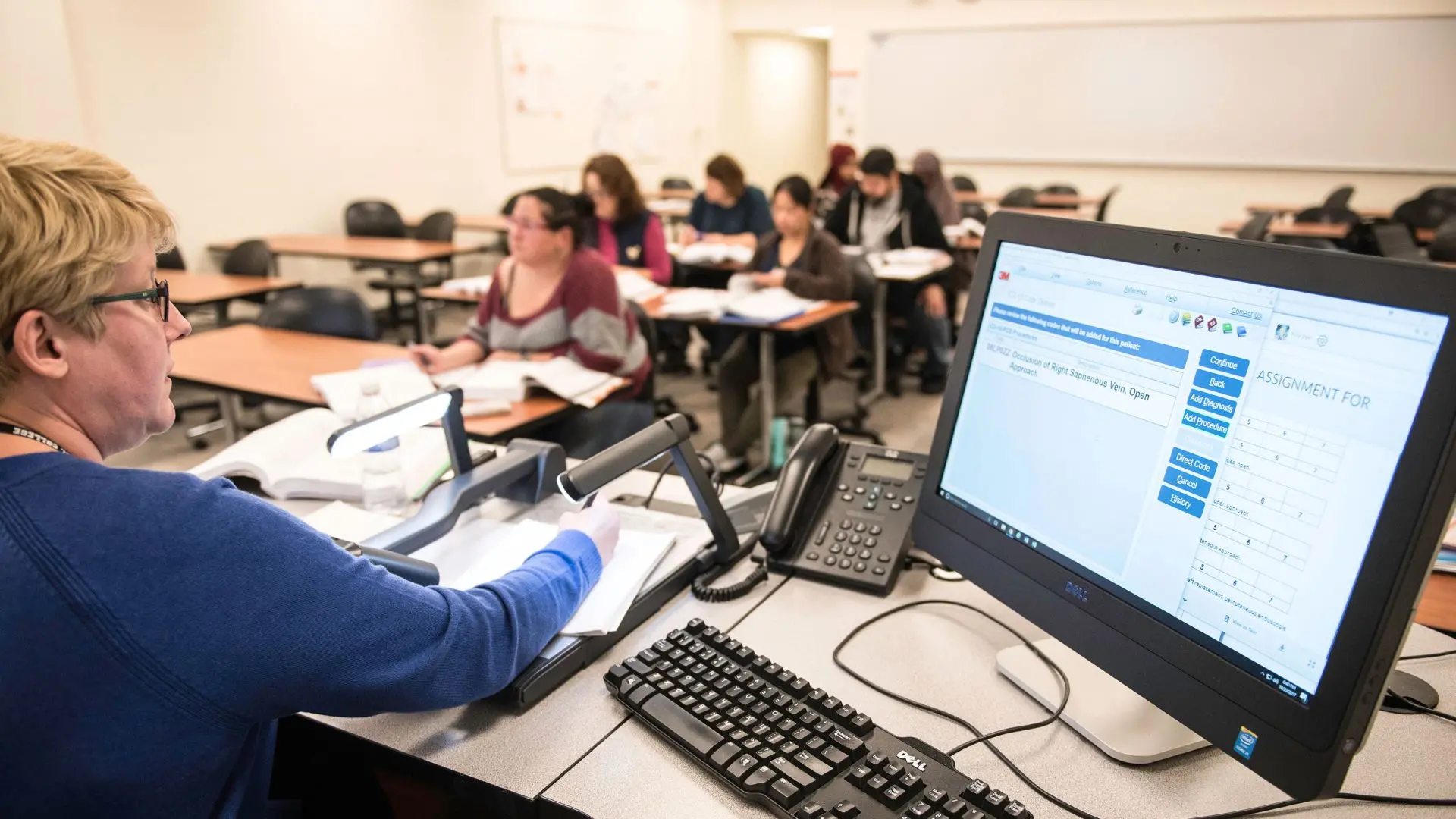 Photo of instructor with students in class.
