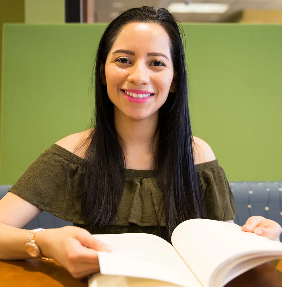 Photo of student in the campus library.