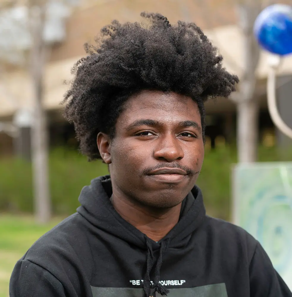 Photo of student on campus.