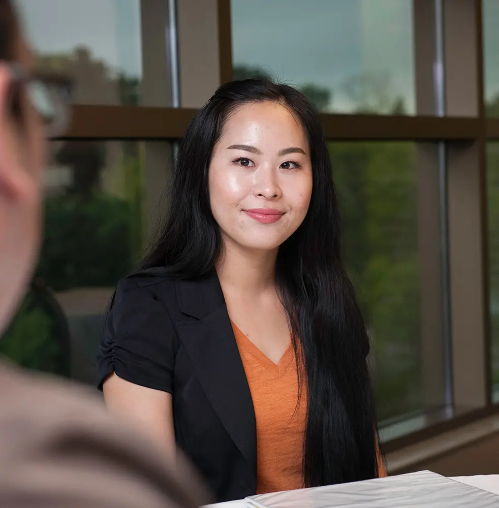 Photo of student on campus.