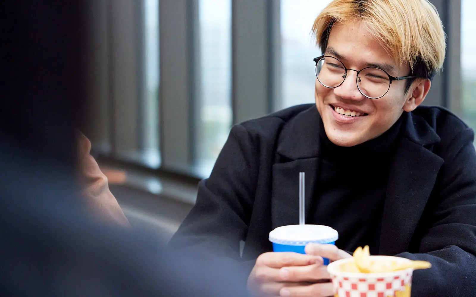 Photo of a student in cafeteria