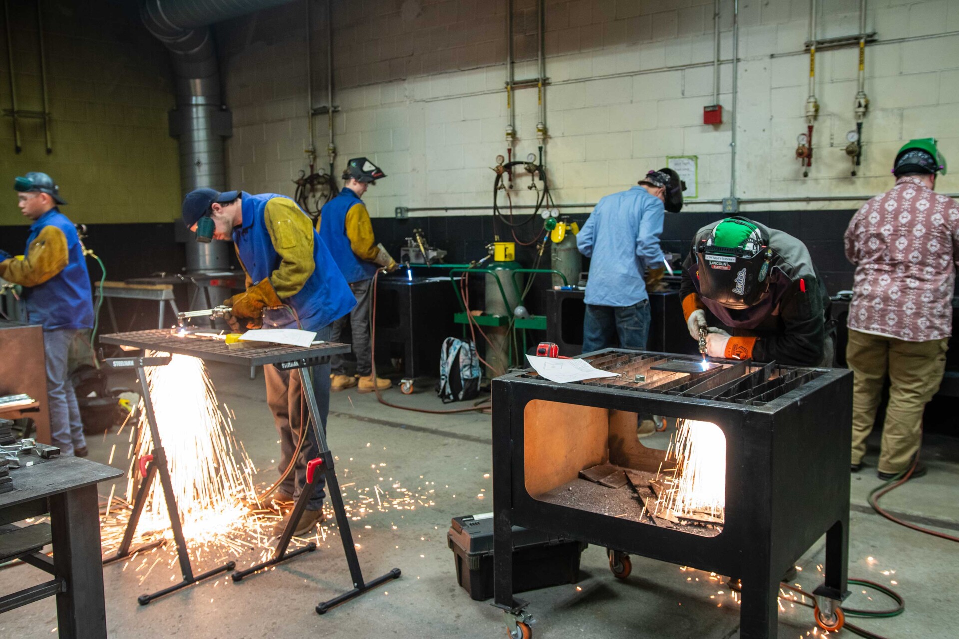 action shot of two welders competing