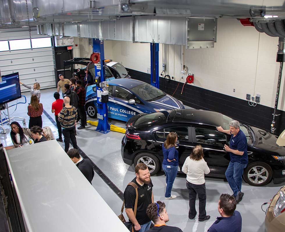 EV Lab with people looking at electric vehicles