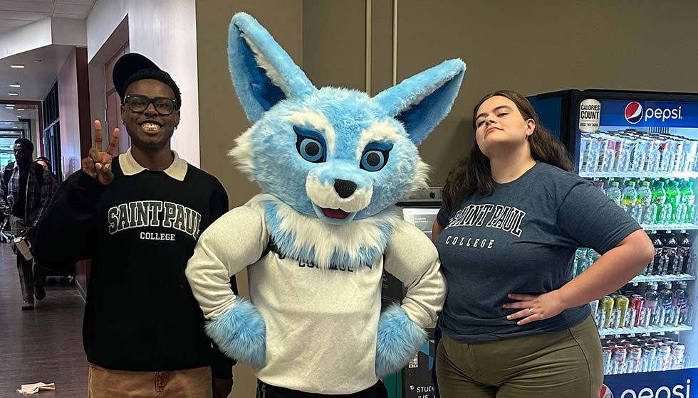 Welcome week workers with the Mascot, Sky the fox.