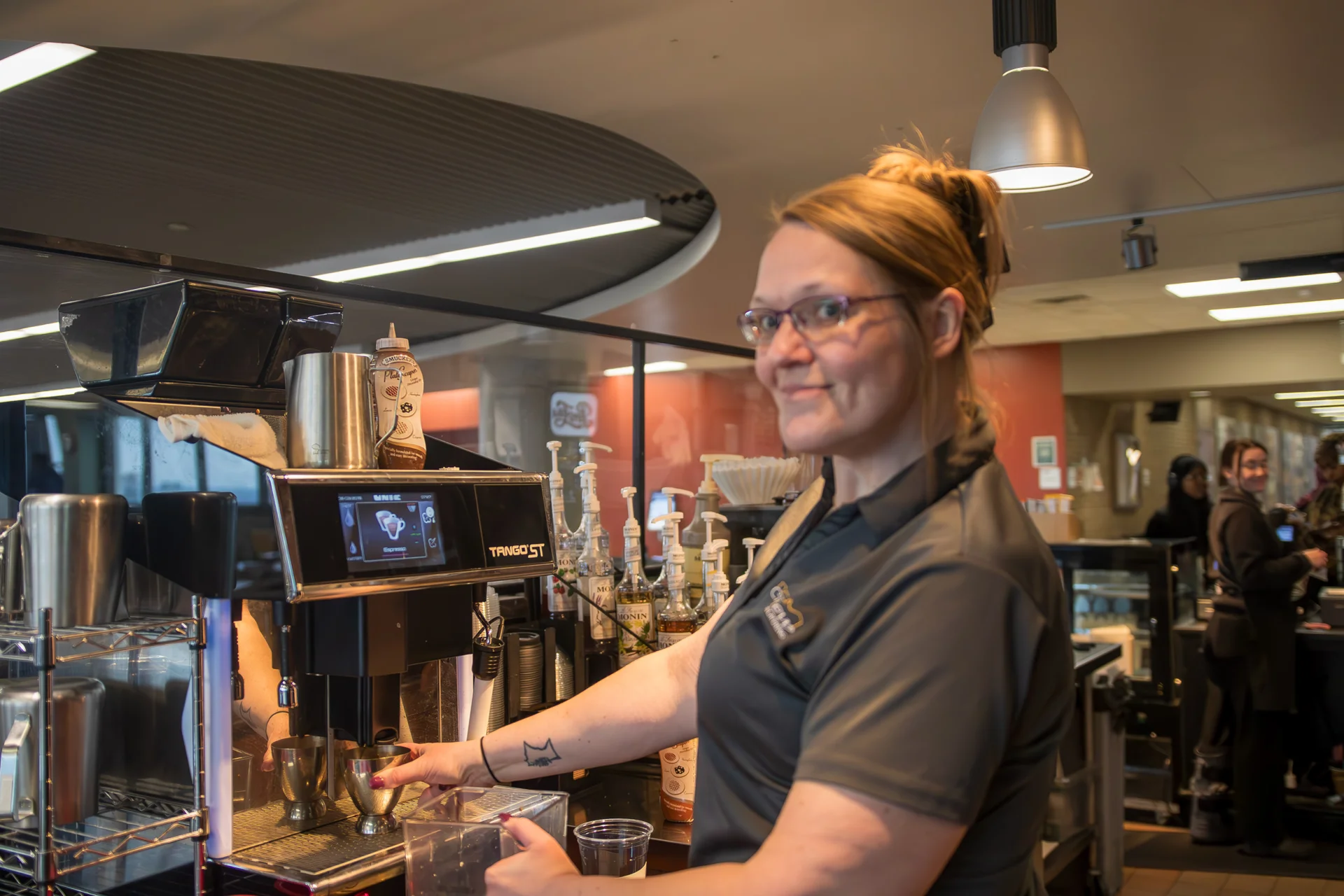 Female staff working at coffee shop