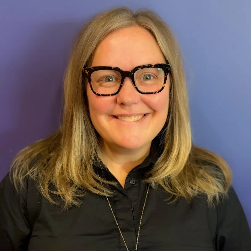 Headshot of female board member, Katie DeCabooter