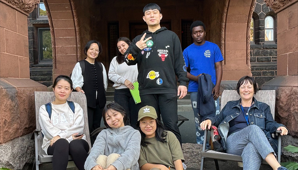 a group of people posting for the camera