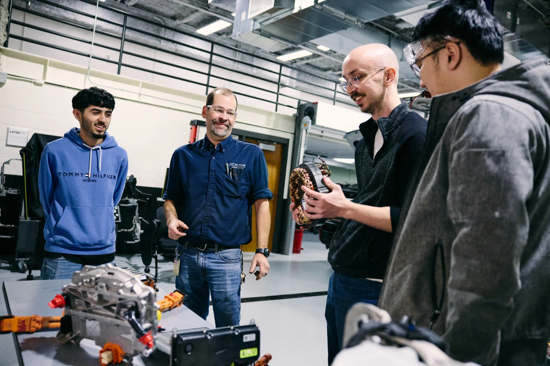 Automotive class working on a vehicle.