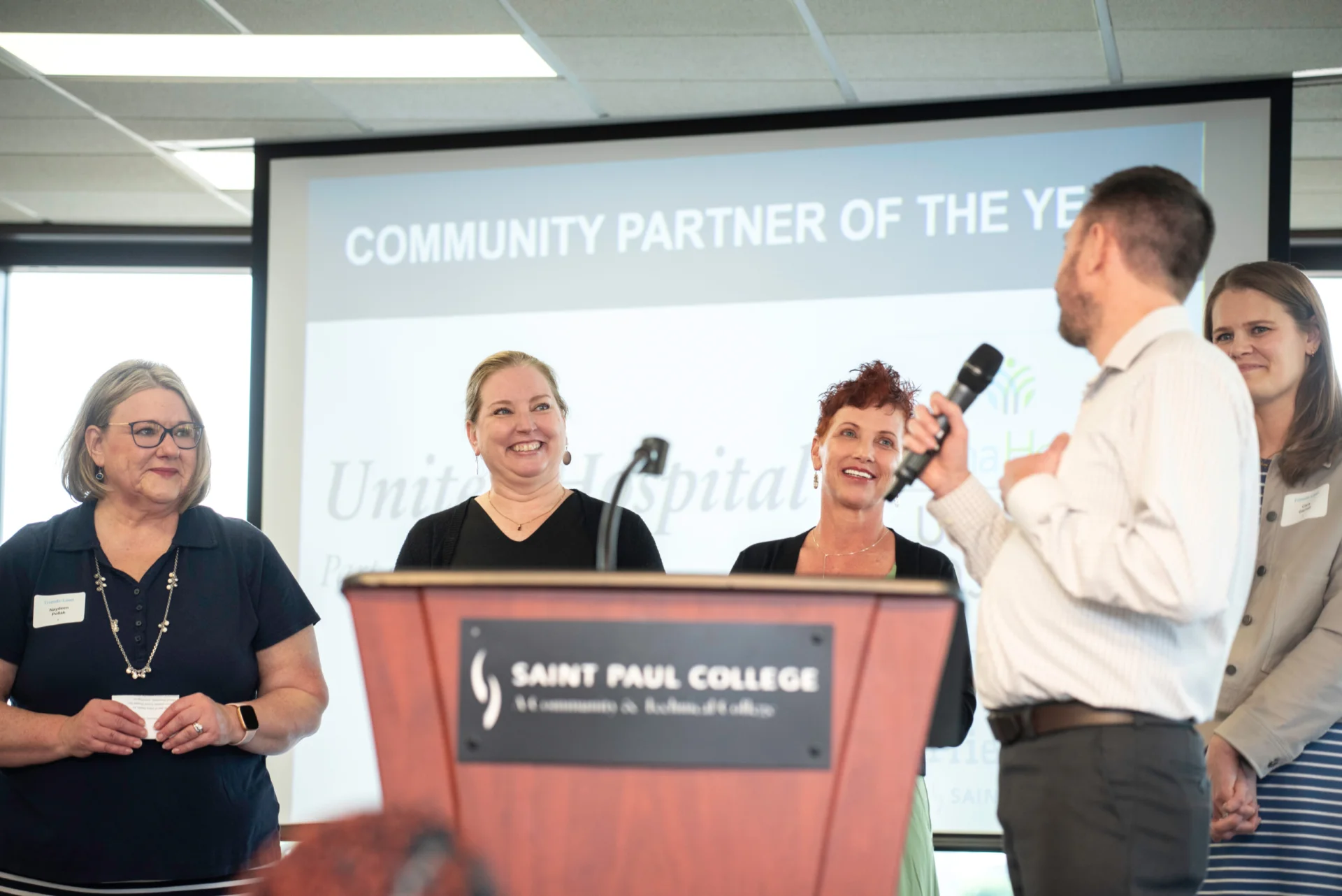 Dan K pictured with a group accepting award for Partner of the Year