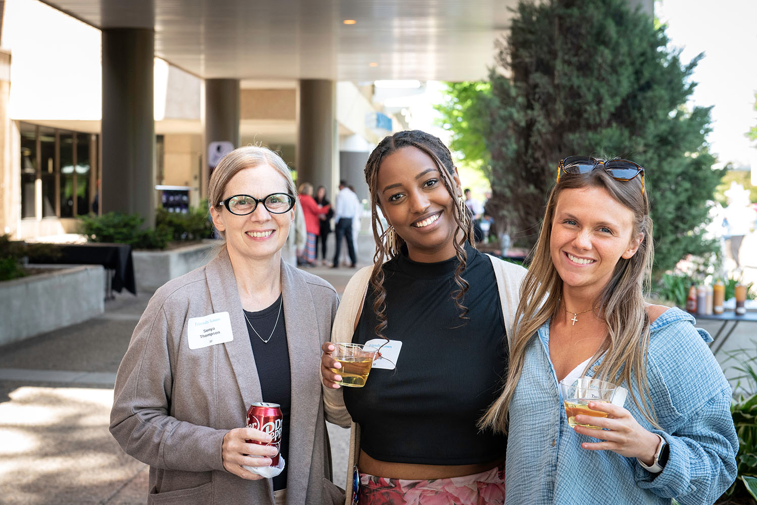 Guests enjoying drinks at Friends on the Lawn 2026 Saint Paul College community fundraising event