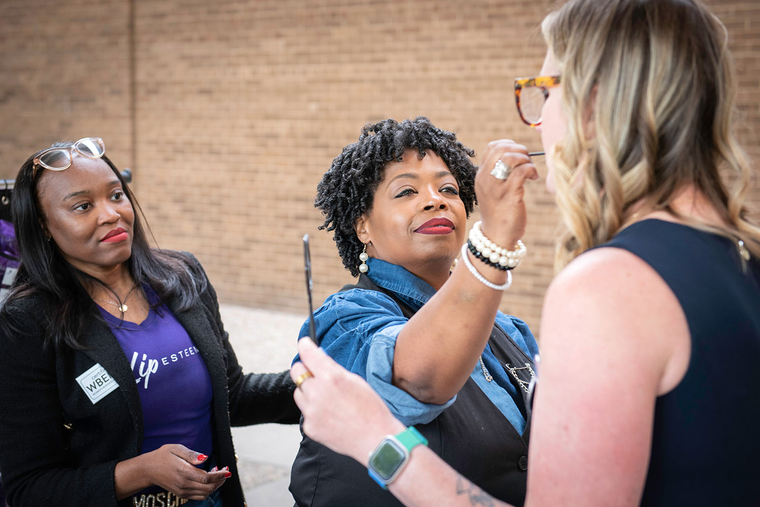 Esthetics service demonstration at Friends on the Lawn 2026 Saint Paul College event