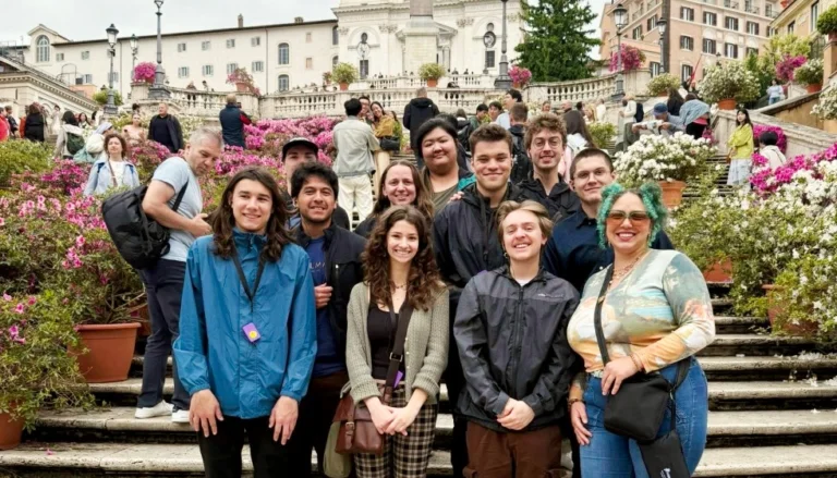 Culinary students study abroad in Italy, Saint Paul College group at historic Italian landmark during culinary arts international experience and cultural travel program