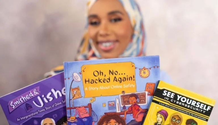 Author and cybersecurity advocate Zinet Kemal displays children's books focused on online safety and cybersecurity education.