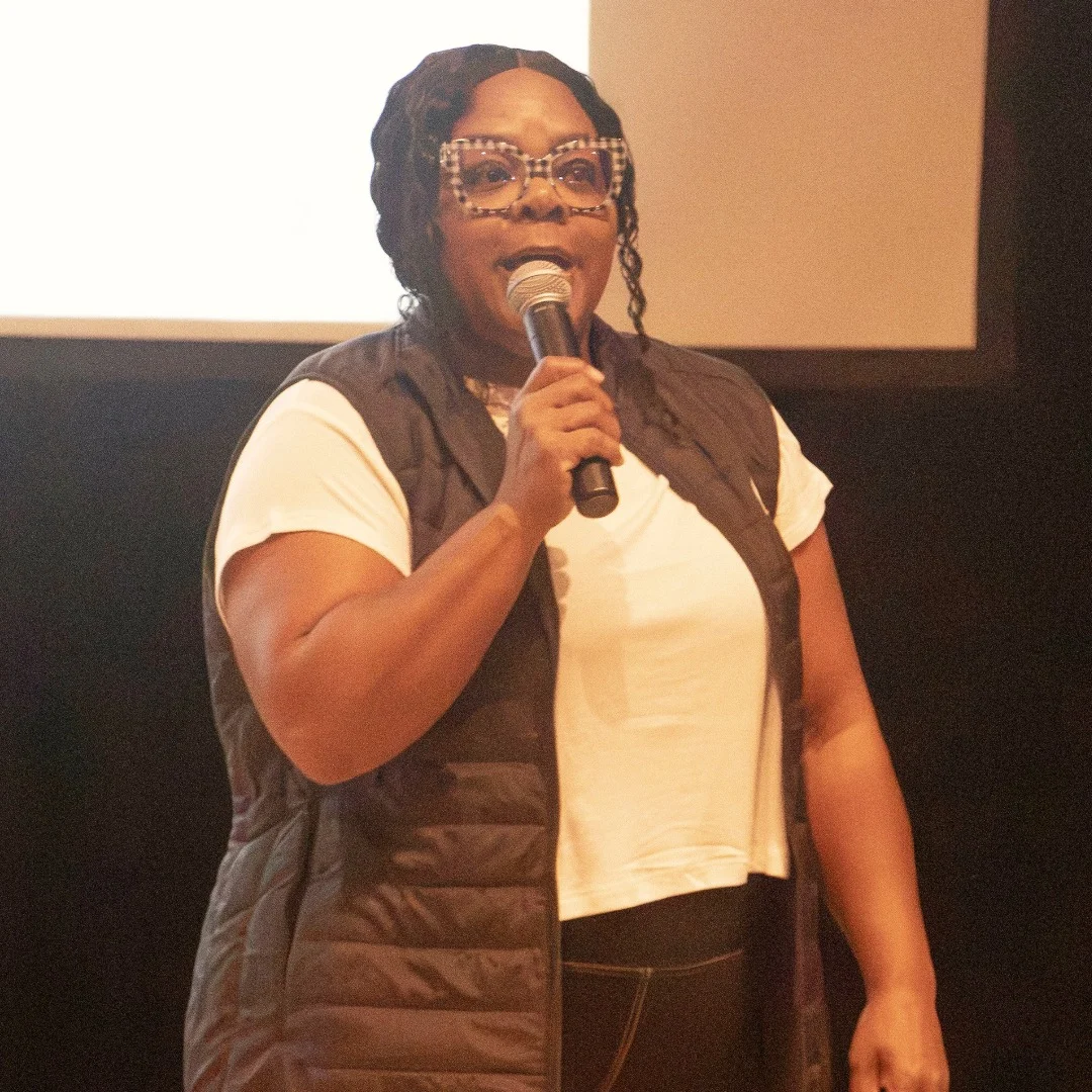 Yolanda McIntosh center stage speaking to trade students