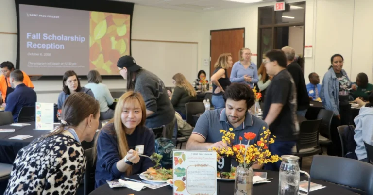Student, faculty, staff, and donors enjoying conversation and lunch at the Scholarship Reception.