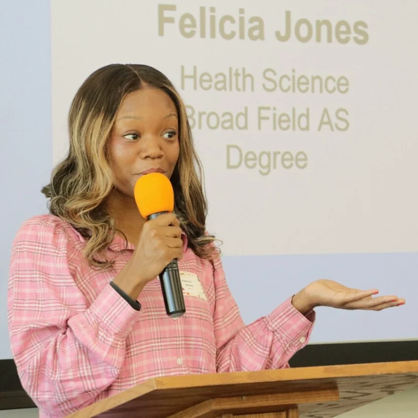 Student speaker, Felicia Jones, speaking at the podium at the front of the Scholarship Reception.